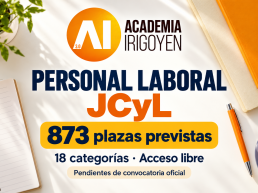 Mesa de estudio con cuaderno, bolígrafo naranja y logo de Academia Irigoyen, con el anuncio de 873 plazas previstas de personal laboral JCyL pendientes de convocatoria oficial.
